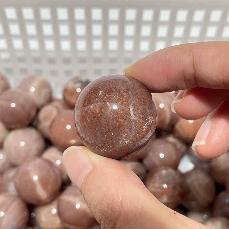 0.8 - 1.1in Beautiful Spark Sunstone Spheres Wholesale - Wholesale Crystals