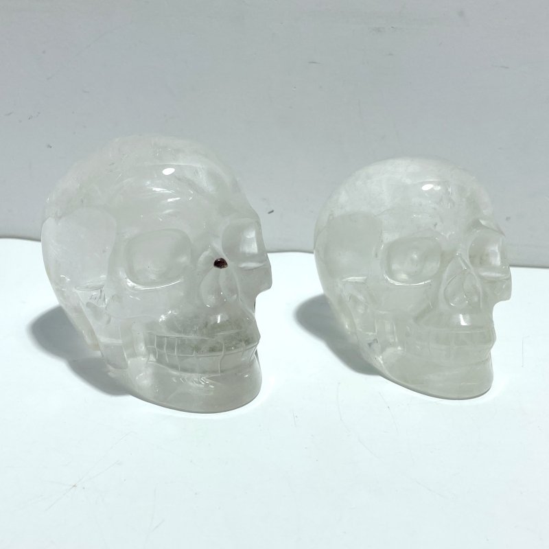 2 Pieces Large Clear Quartz Skull Carving - Wholesale Crystals