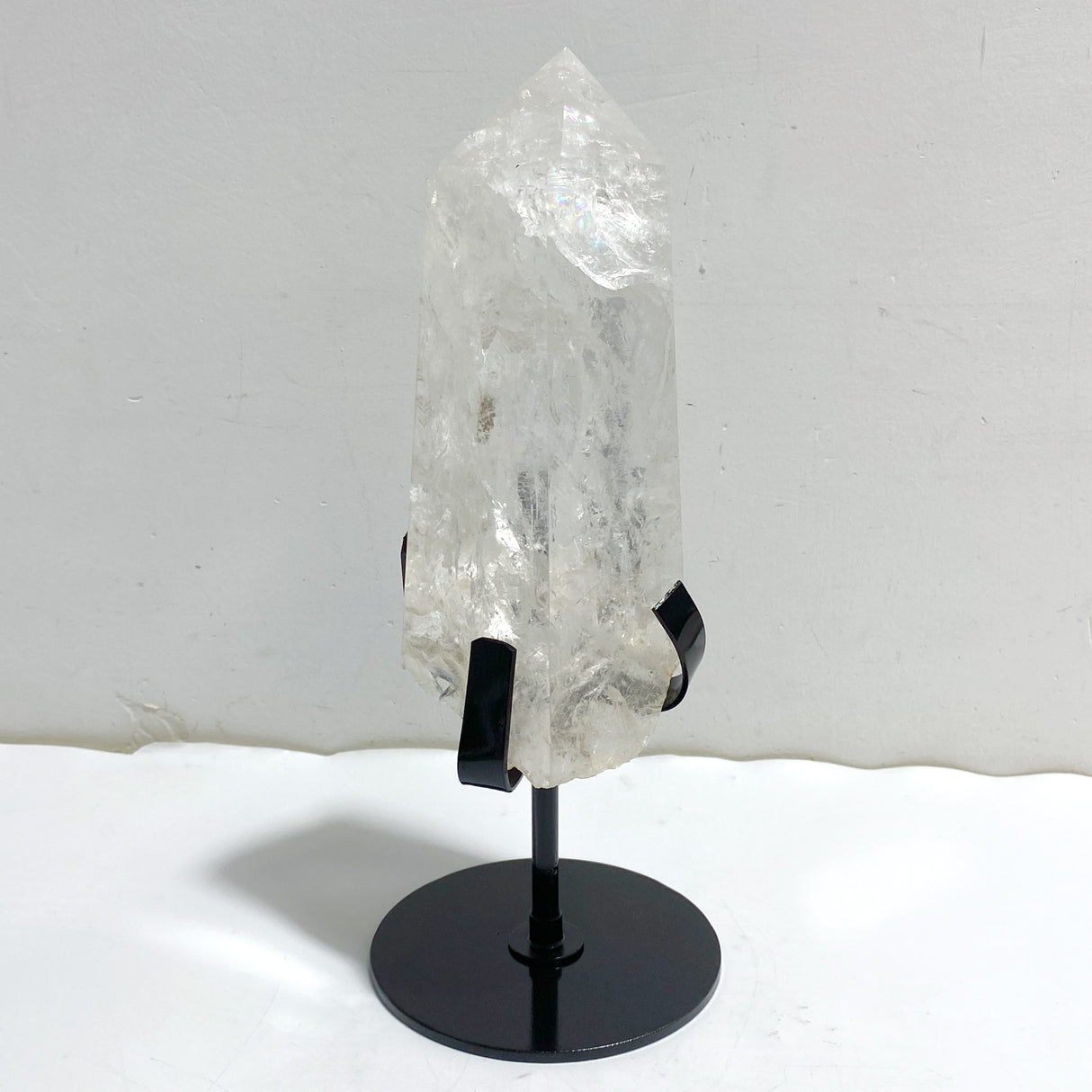 Clear Quartz Point Raw Bottom With Stand