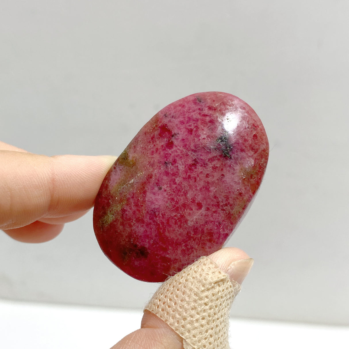 High Quality Rhodonite Palm Stone Wholesale