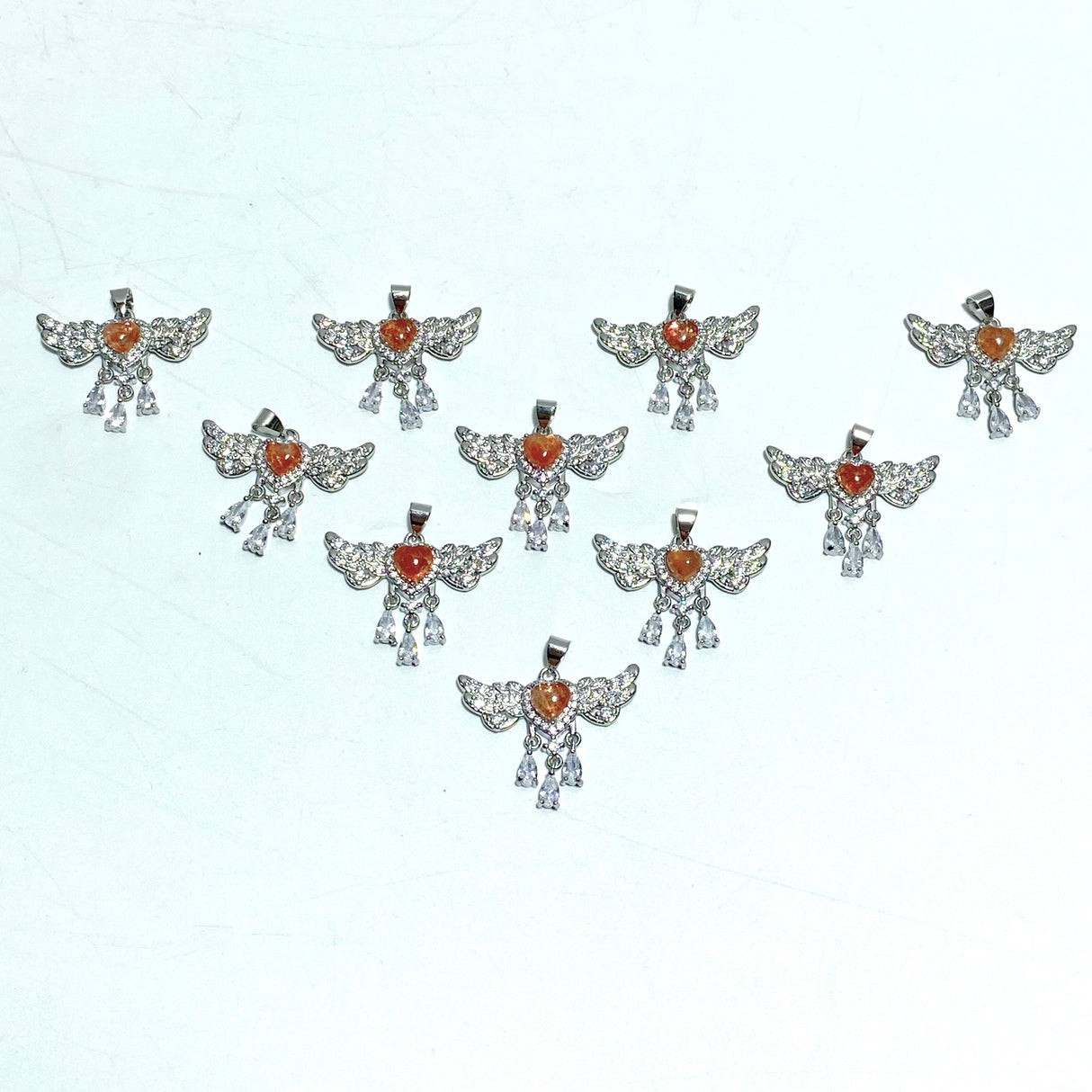 Beautiful Sunstone Heart Wing Pendants Wholesale