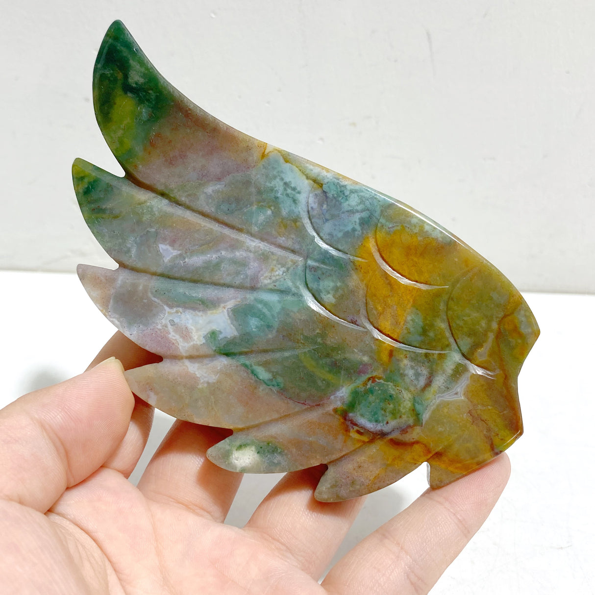 Ocean Jasper Heart Wing Carving With Stand