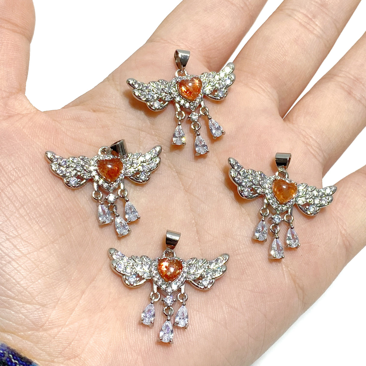 Beautiful Sunstone Heart Wing Pendants Wholesale