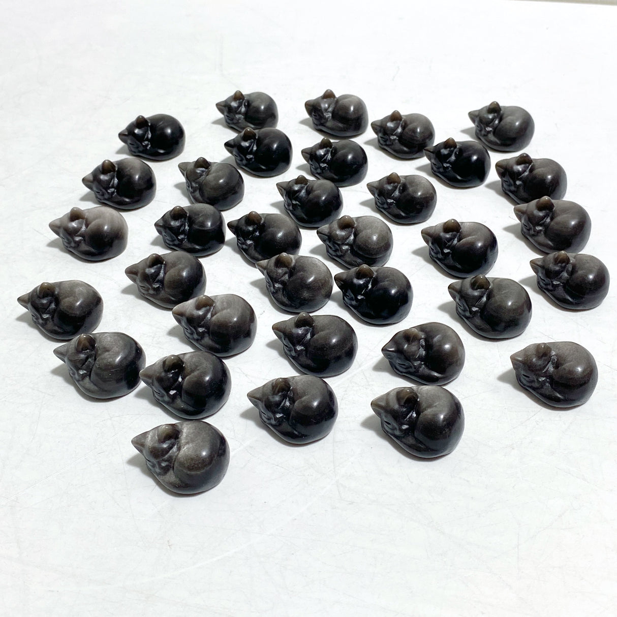 2.4cm Small Silver Sheen Obsidian Sleeping Cat Carving Wholesale