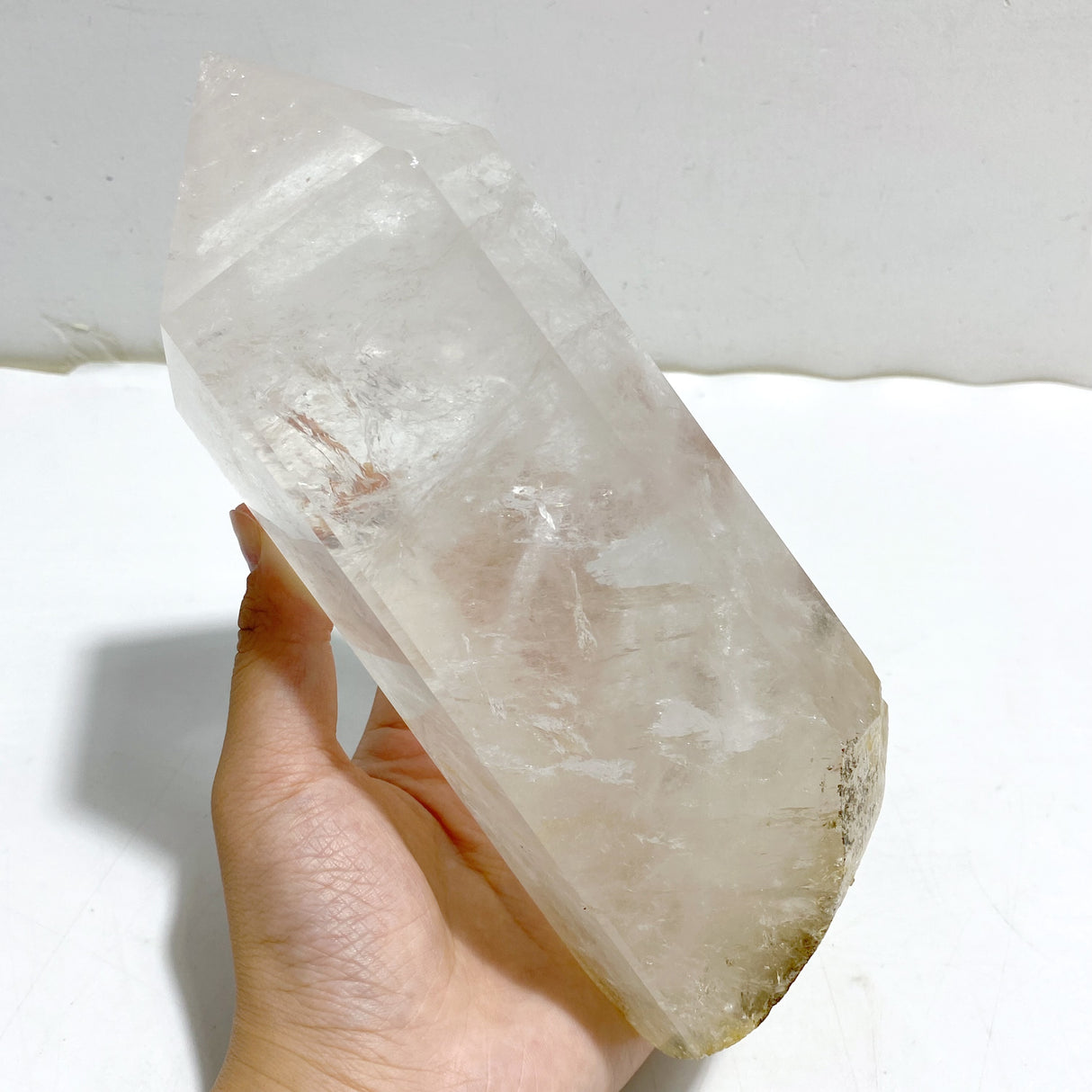 Large Clear Quartz Point Raw Bottom With Stand