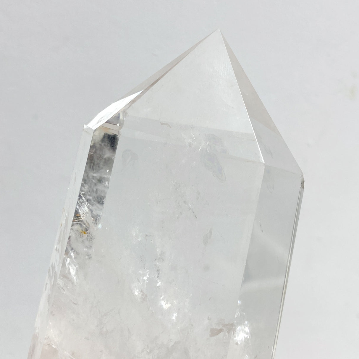 Large Clear Quartz Point Raw Bottom With Stand