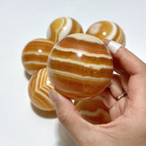 1.9 - 2.5inch Yellow Calcite Stripe Spheres Wholesale - Wholesale Crystals