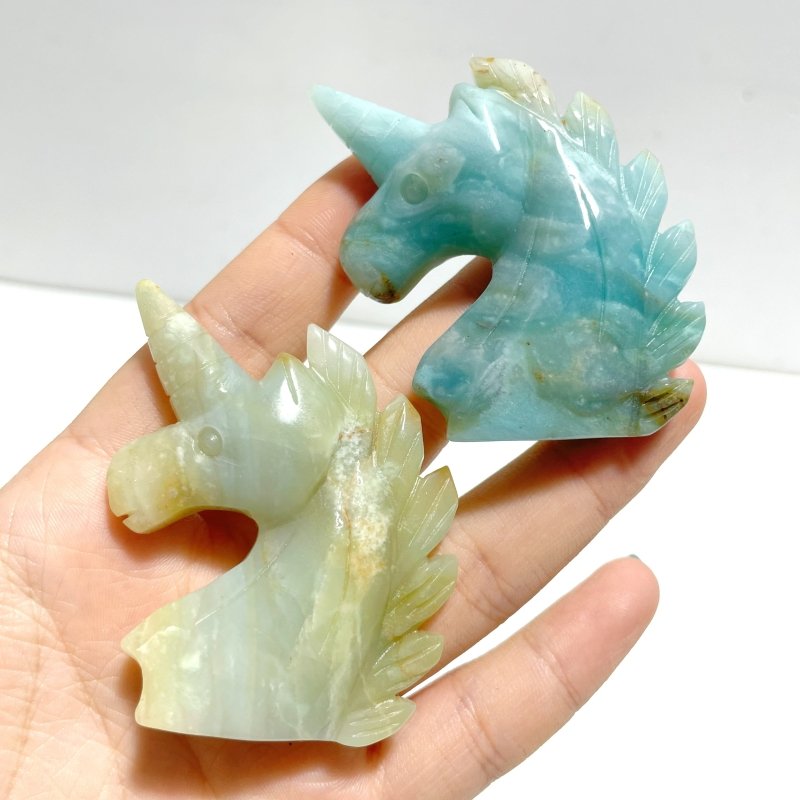 39 Pieces Small Caribbean Calcite Unicorn Carving - Wholesale Crystals