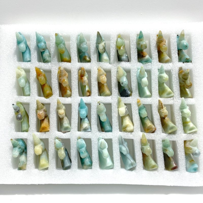 39 Pieces Small Caribbean Calcite Unicorn Carving - Wholesale Crystals