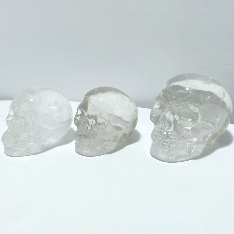 7 Pieces Clear Quartz Skull Carving - Wholesale Crystals