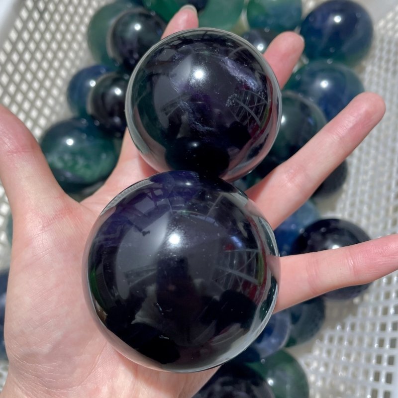 71 Pieces 57.8lbs Deep Green/Purple/Blue Fluorite Spheres - Wholesale Crystals