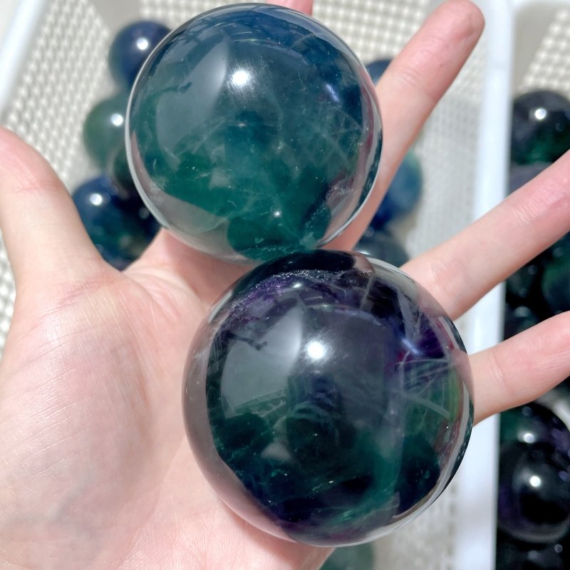 71 Pieces 57.8lbs Deep Green/Purple/Blue Fluorite Spheres - Wholesale Crystals