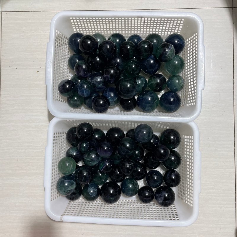 71 Pieces 57.8lbs Deep Green/Purple/Blue Fluorite Spheres - Wholesale Crystals