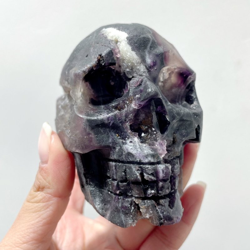 9 Pieces Purple Fluorite Skull Carving - Wholesale Crystals