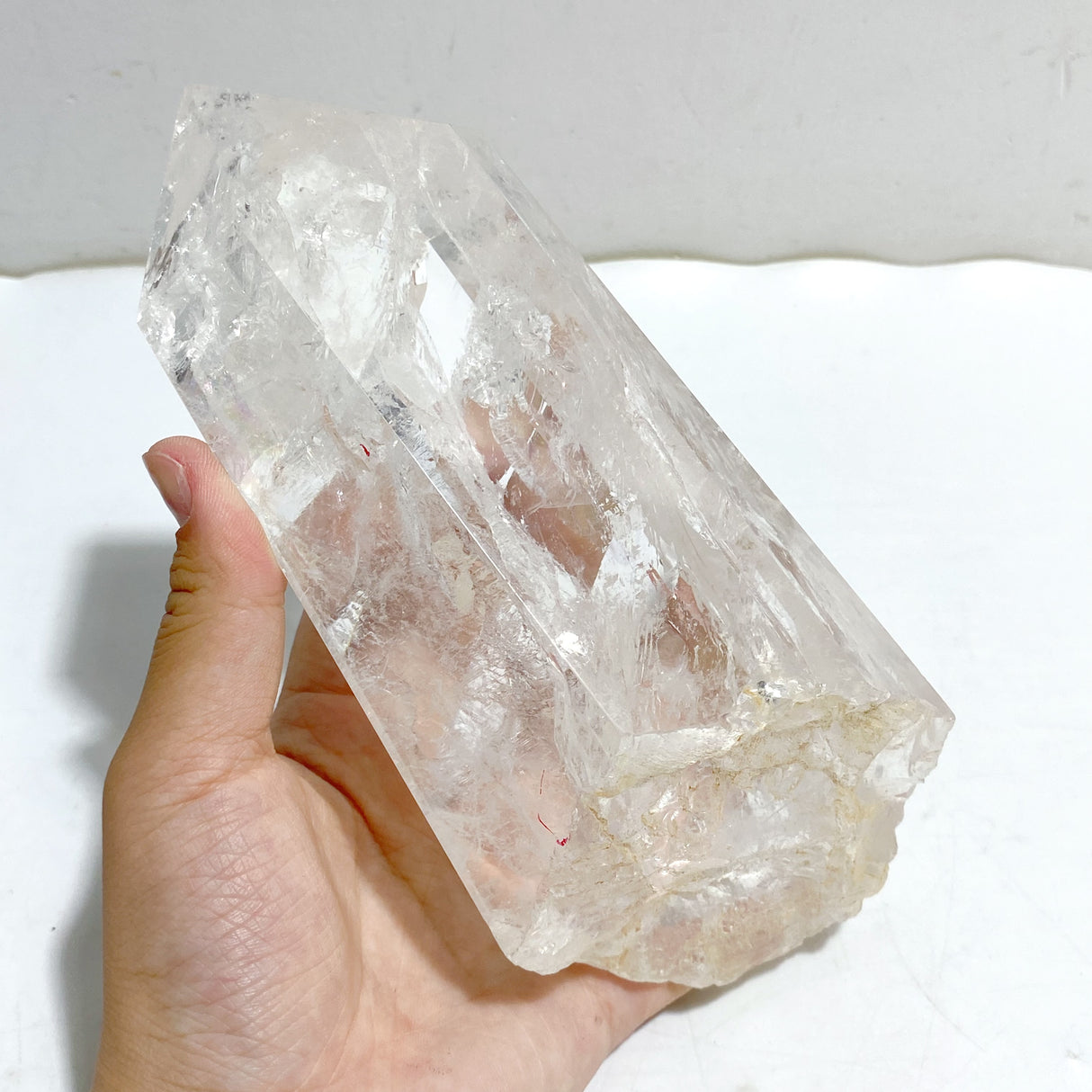 Clear Quartz Point Raw Bottom With Stand