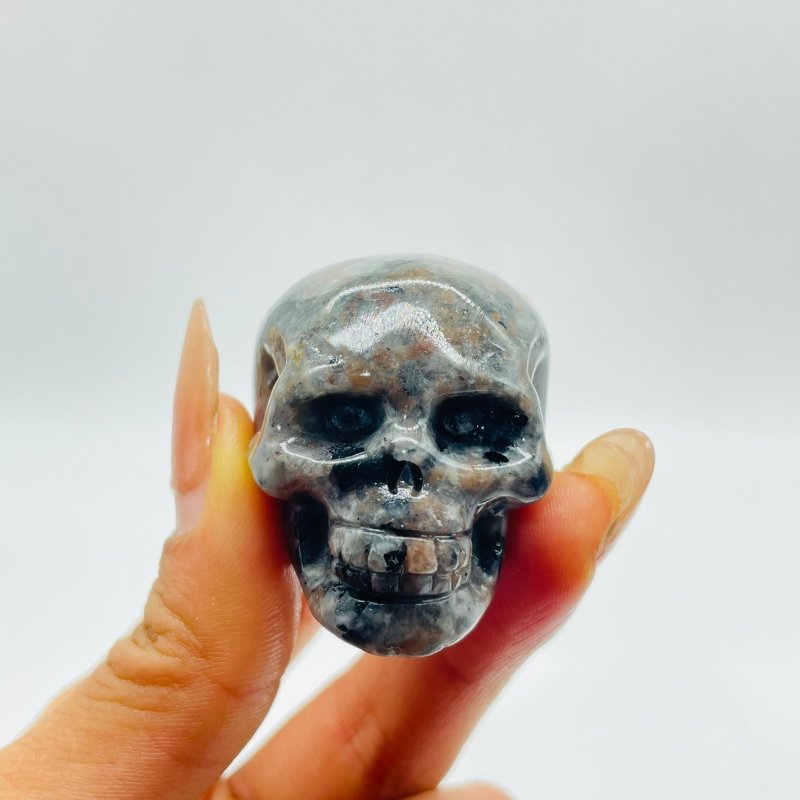 1.7in Skull Carving Wholesale Yooperlite (UV Reactive) Larvikite -Wholesale Crystals