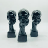 Black Obsidian Hand Holding Skull Carving Wholesale -Wholesale Crystals